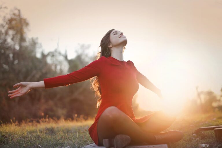 red women on the grass